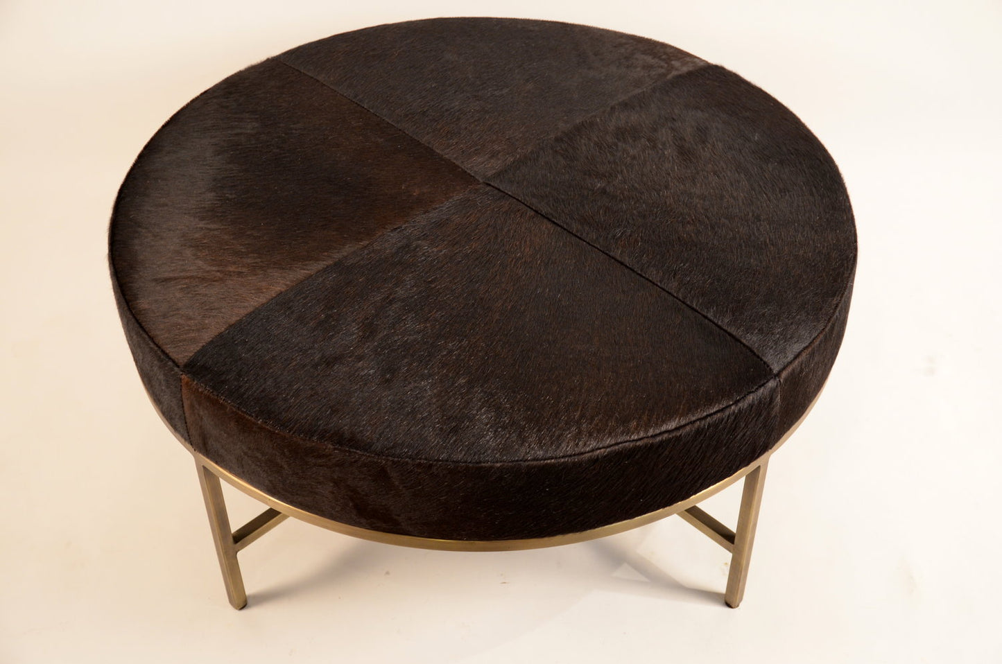 Ottoman 'Tambour' en cuir naturel