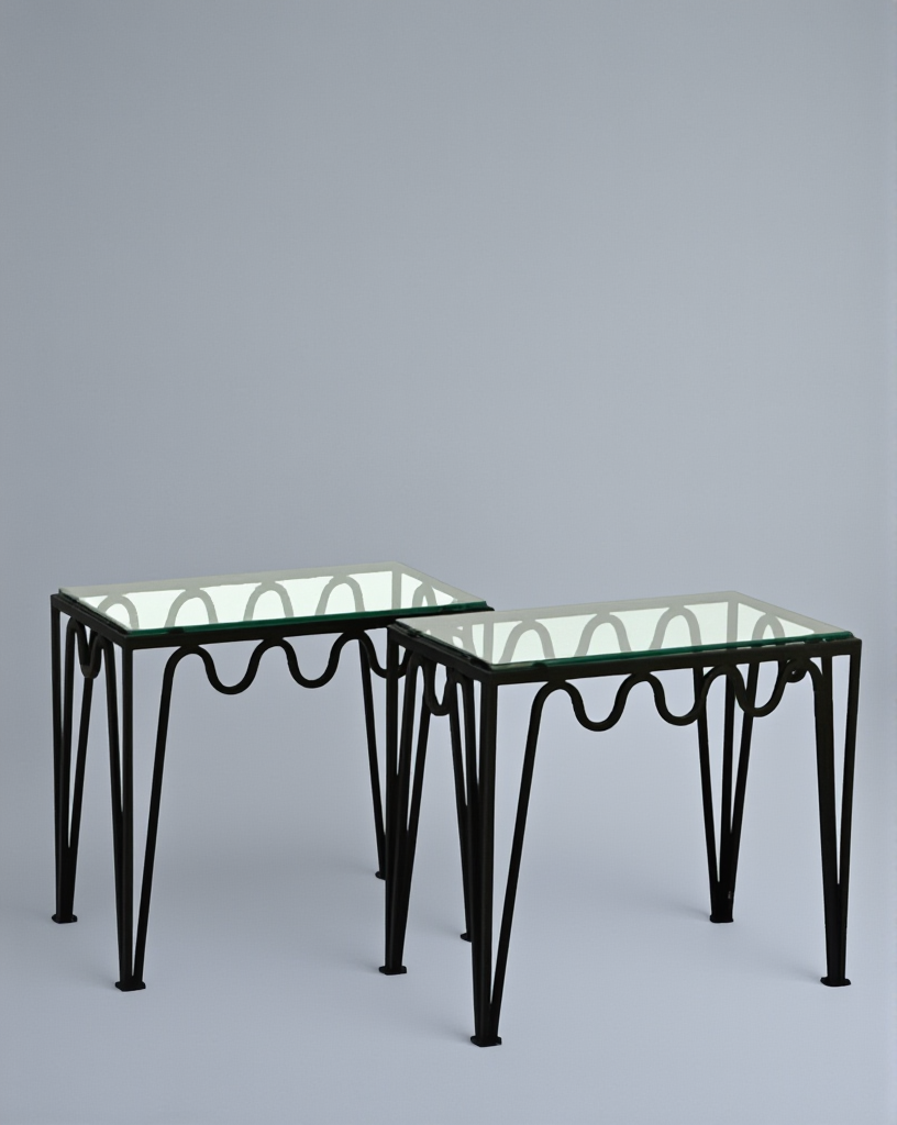 Pair of 'Meander' black/glass side tables.